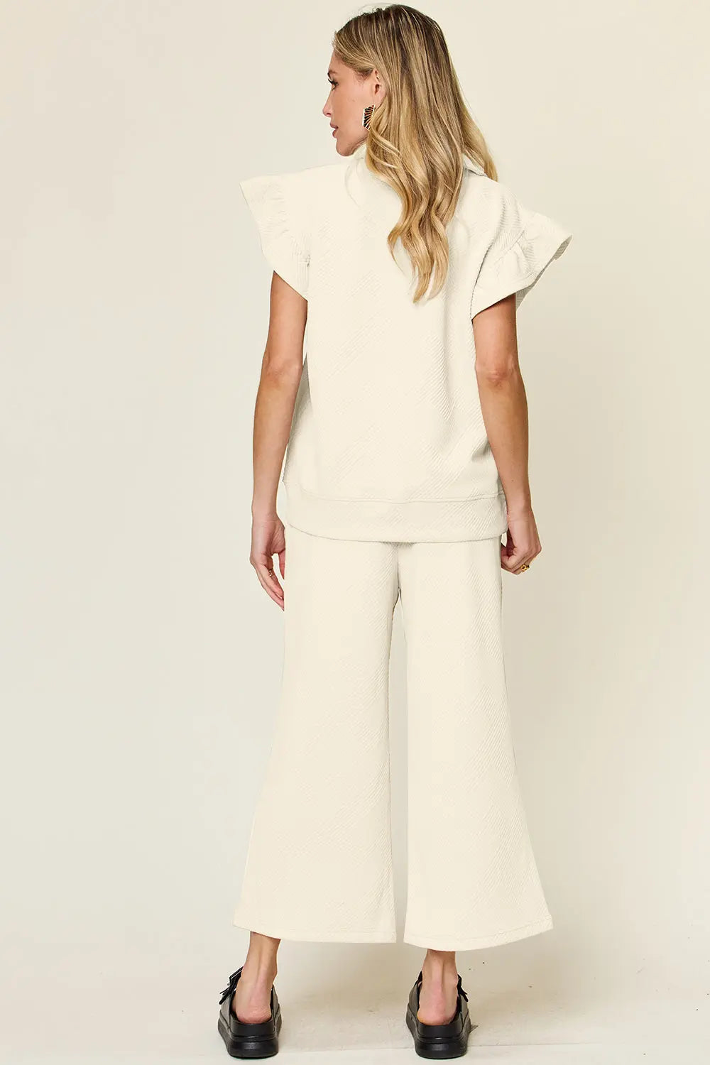 Double Take Texture Ruffle Short Sleeve Top and Drawstring Wide Leg Pants Set Trendsi