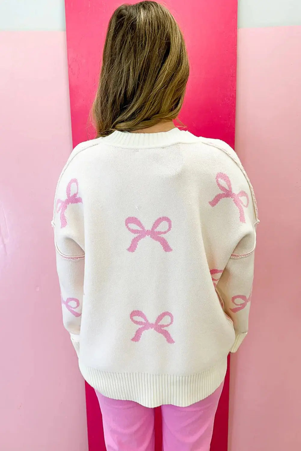 Pink Bow Print Ribbed Trim Exposed Seam Drop Shoulder Loose Sweater Dear-Lover Dropshipping