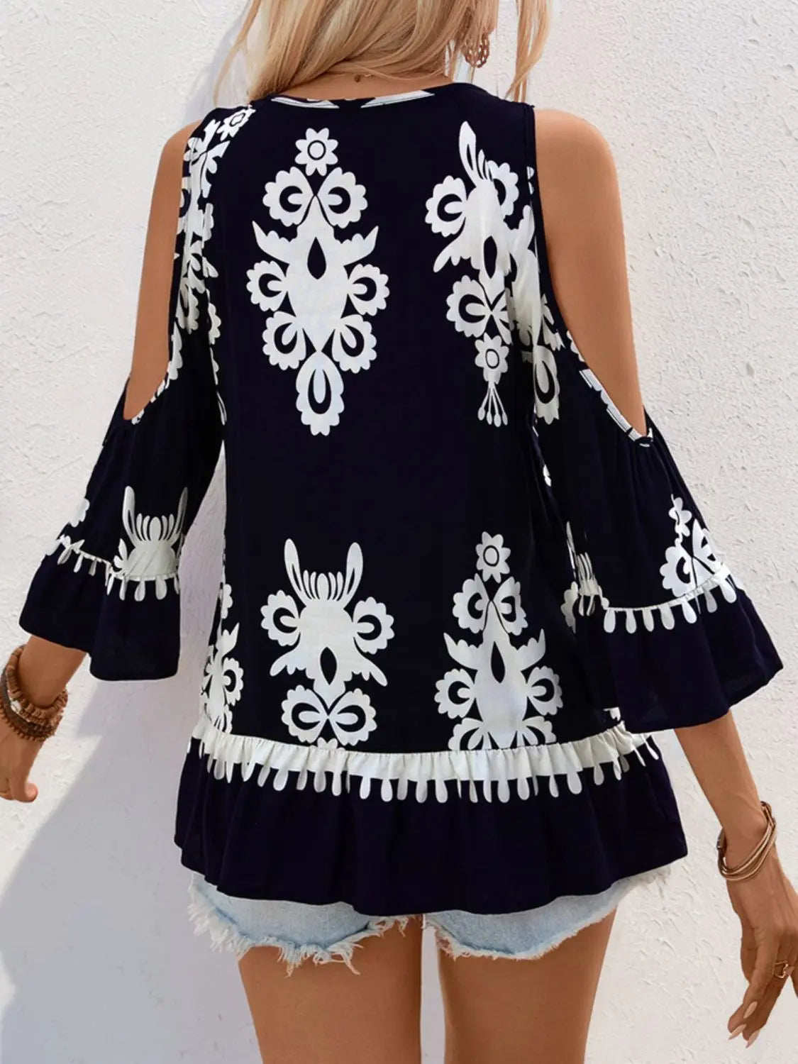 Tassel Printed Tie Neck Cold Shoulder Blouse Trendsi